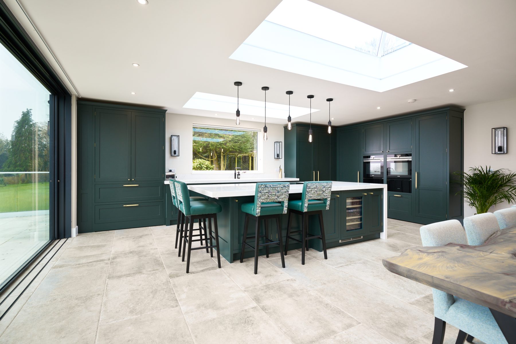 kitchen with 5 pendant lights above
